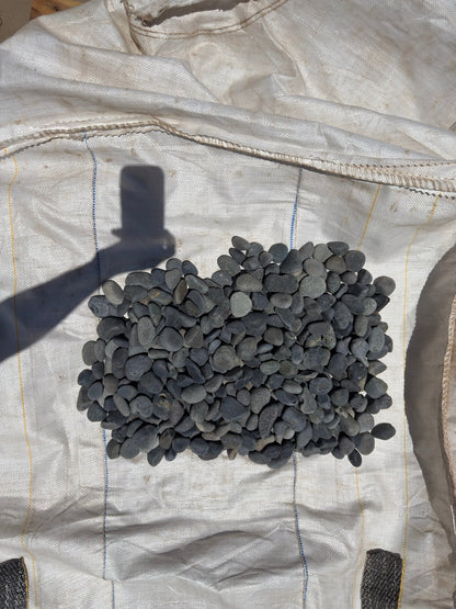 Black Mexican beach pebbles half to 1 inch — Pacific Pebble