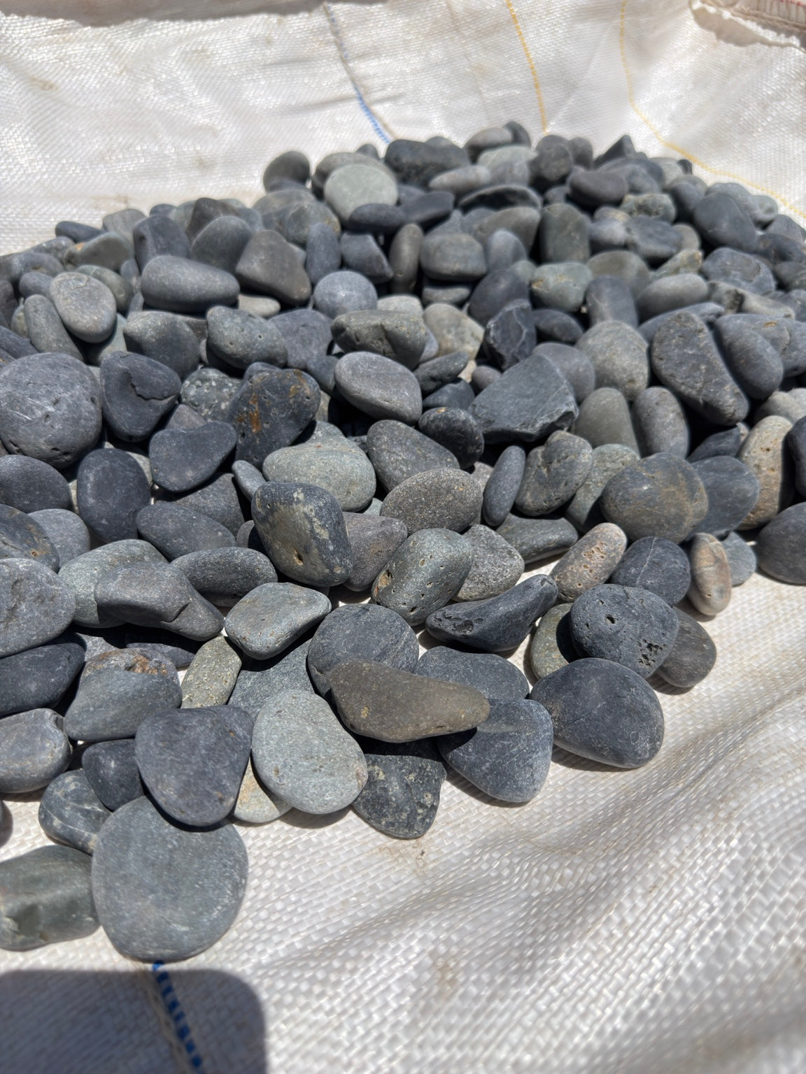 Black Mexican beach pebbles half to 1 inch — Pacific Pebble